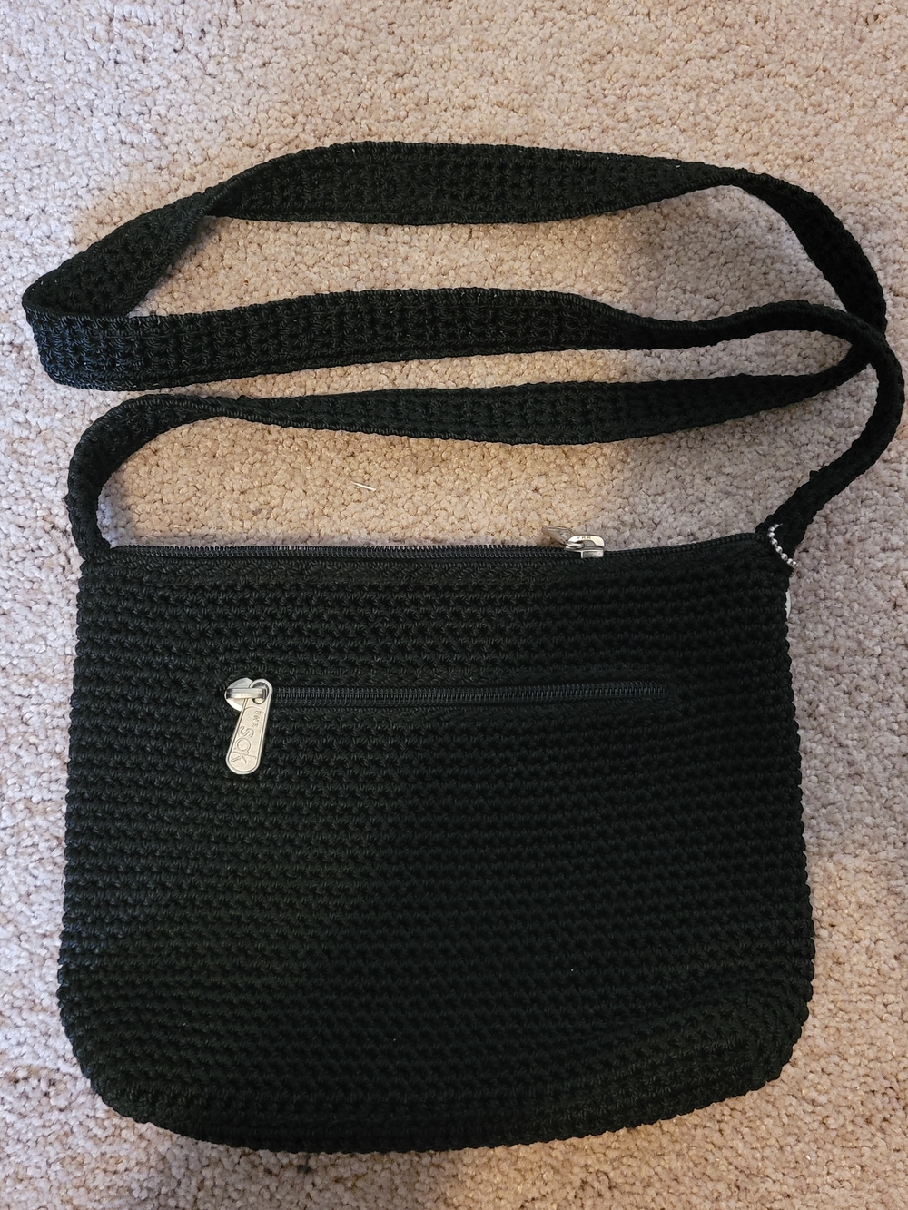 The Sak Black Crochet Crossbody Bag with Front Zip Pocket